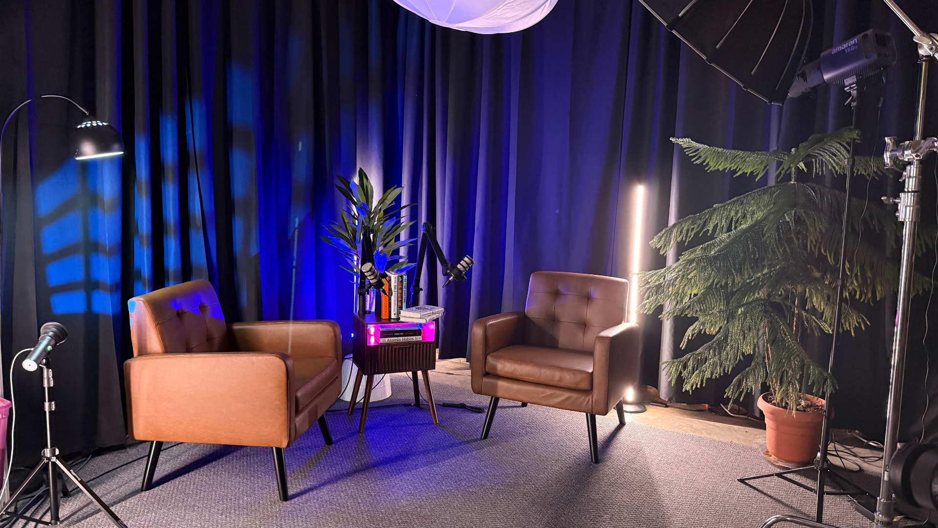 Two-chair recording set inside the JW podcast studio